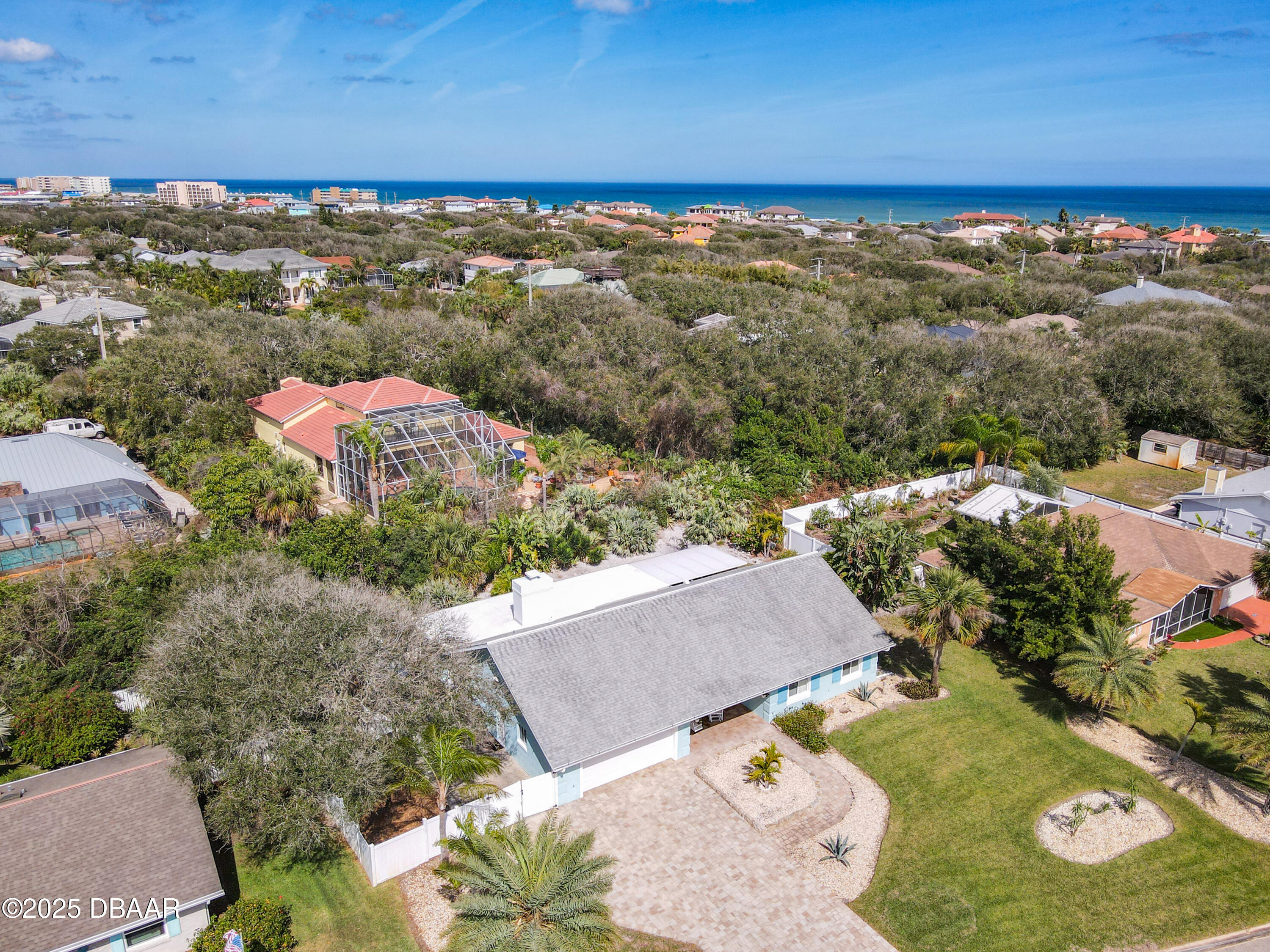 86 Rains Court Ponce Inlet, FL 32127 - Photo 65 of 71 an aerial view of a house with a yard