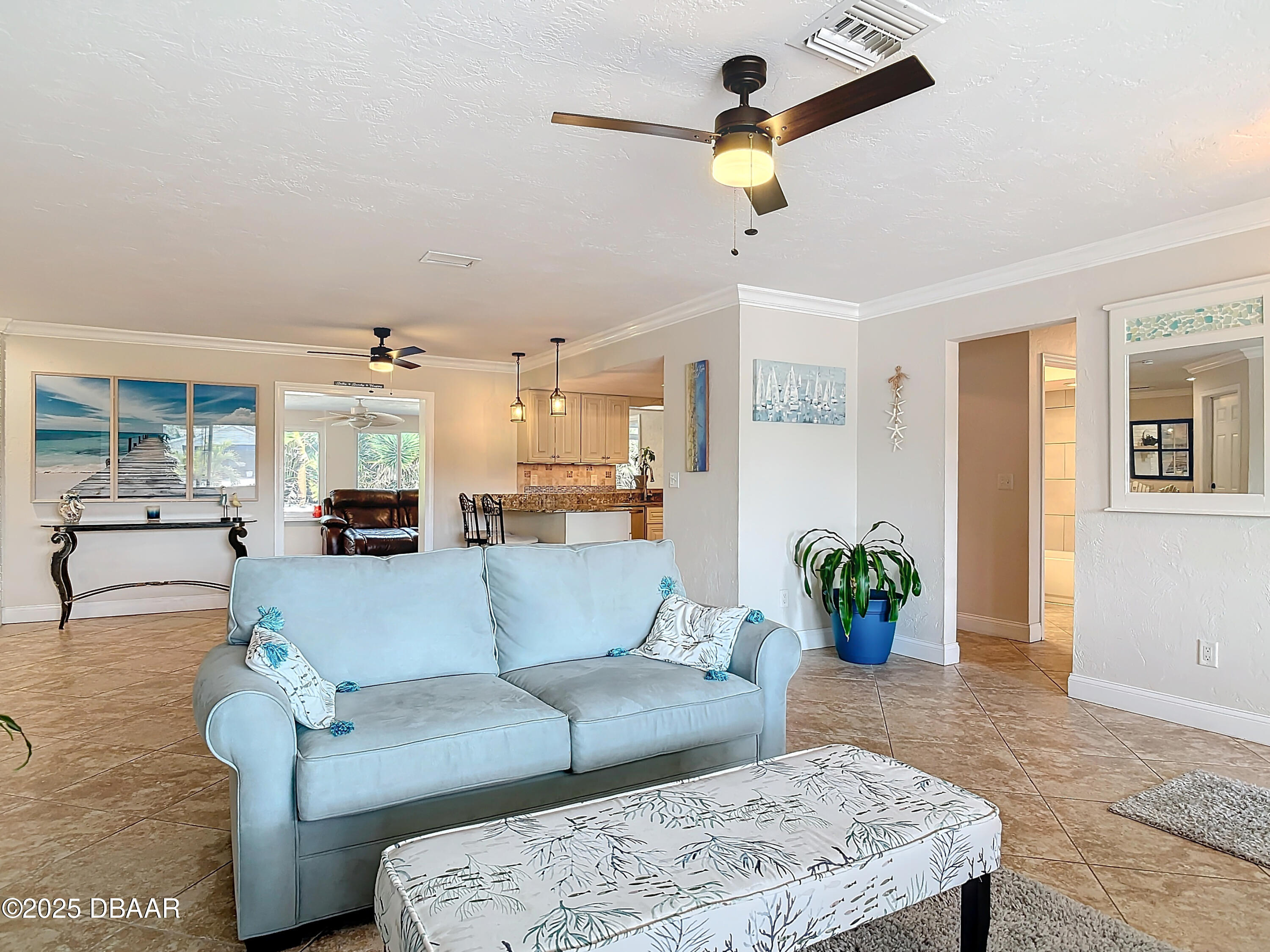86 Rains Court Ponce Inlet, FL 32127 - Photo 8 of 71 a living room with furniture and kitchen view