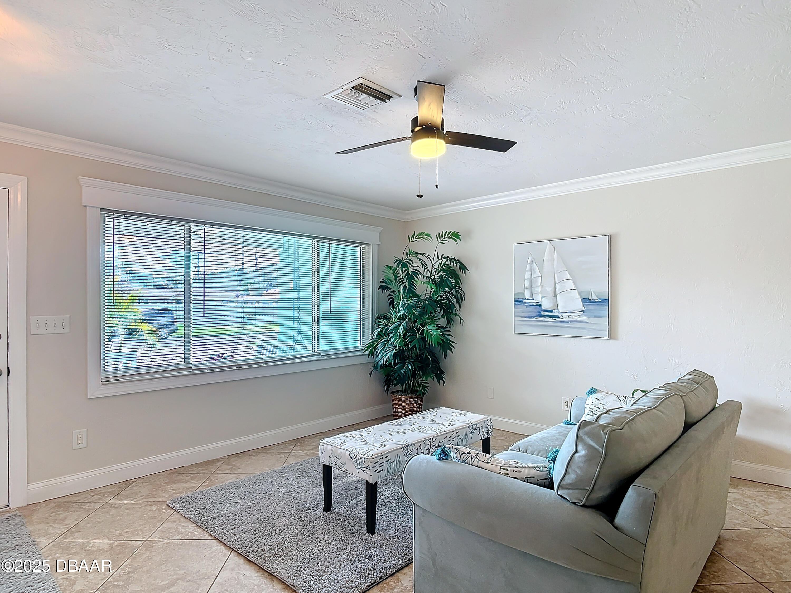 86 Rains Court Ponce Inlet, FL 32127 - Photo 9 of 71 a living room with furniture and a window
