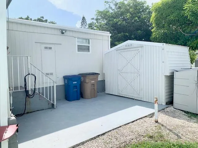 a view of a house with a garage