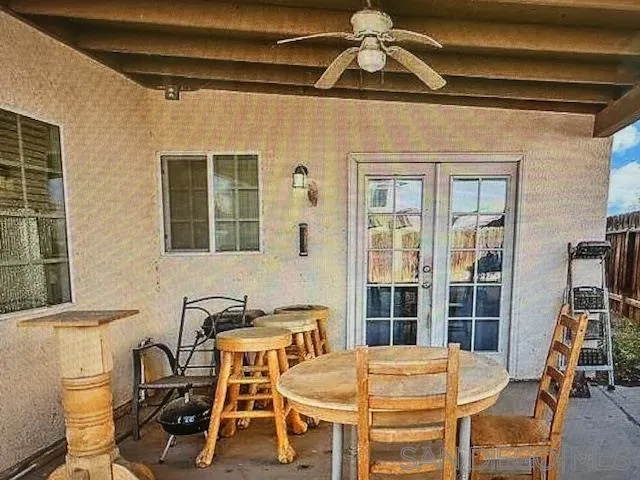 312 Chisolm Trail Imperial, CA 92251 - Photo 2 of 10 a view of a dining room with furniture window and outside view