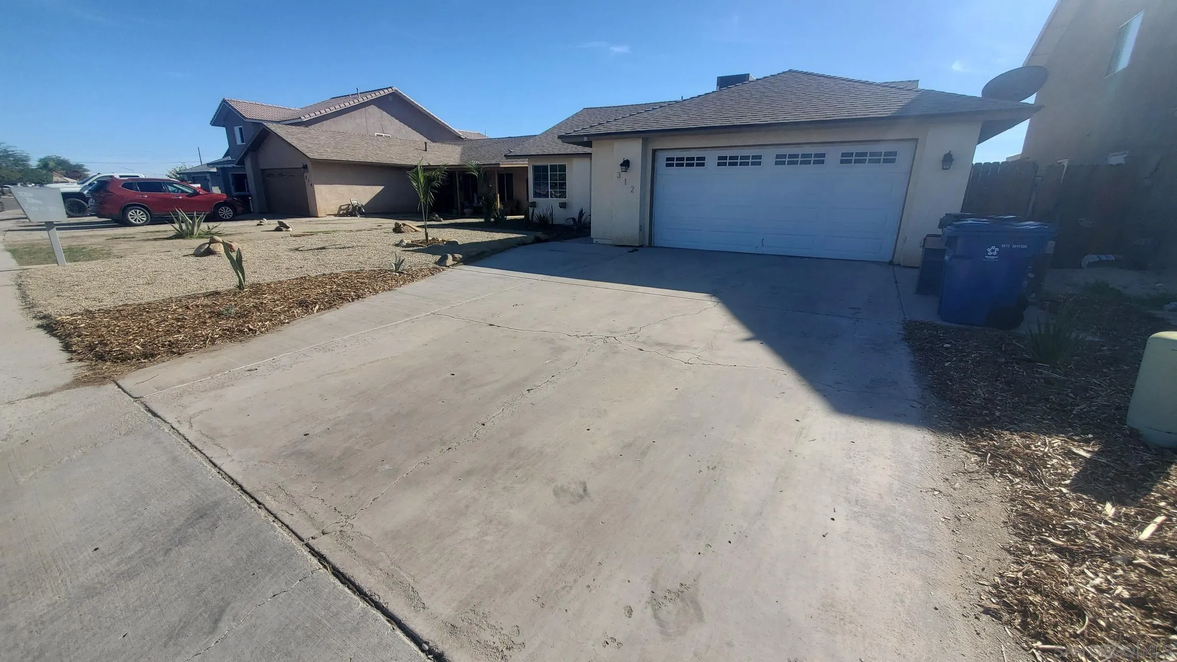 312 Chisolm Trail Imperial, CA 92251 - Photo 10 of 10 a front view of a house with a yard