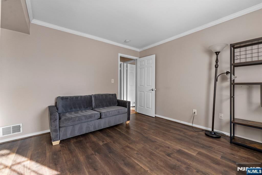 753 Summer, Unit 3D Newark, NJ 07104 - Photo 22 of 41 a living room with furniture and a hard wood floor
