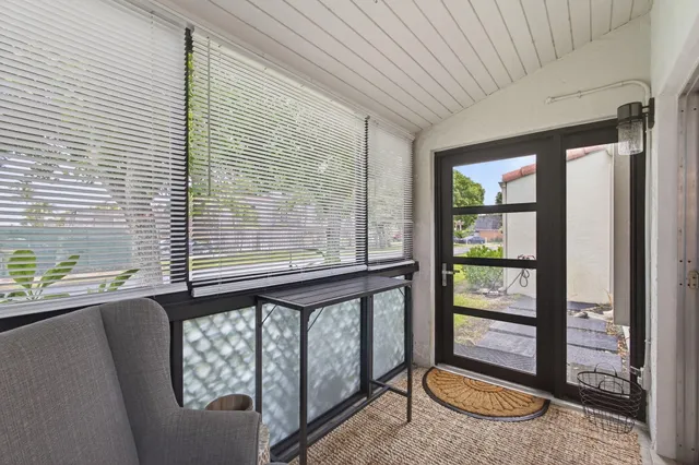 a view of a porch with furniture