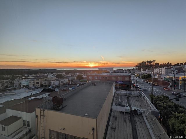 a front view of a building and a yard