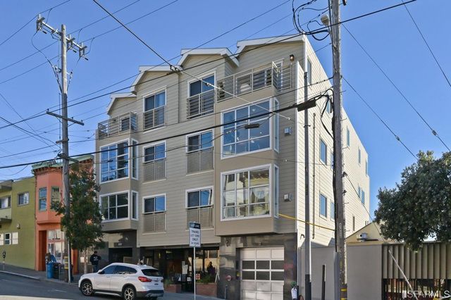 a view of hall way with furniture
