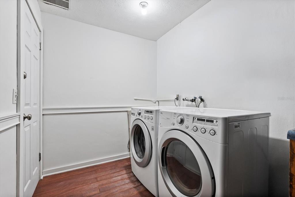 1700 Patricia Avenue Dunedin, FL 34698 - Photo 28 of 31 a utility room with dryer and washer
