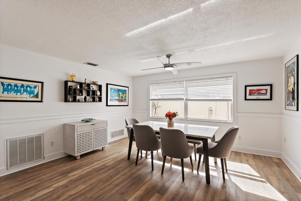 1700 Patricia Avenue Dunedin, FL 34698 - Photo 10 of 31 a view of a dining room with furniture and window