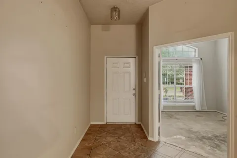 a view of a hallway with closet