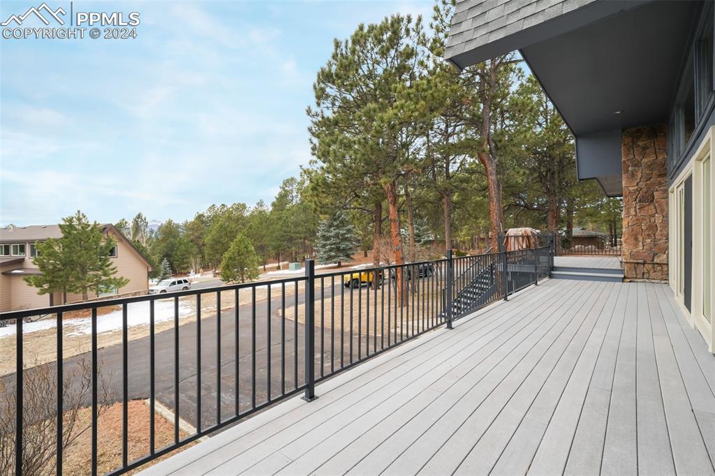 18585 Augusta Drive Monument, CO 80132 - Photo 48 of 50 a view of a balcony with wooden floor