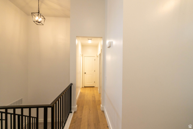 293 North Pheasant Drive Mapleton, UT 84664 - Photo 7 of 20 Corridor featuring light wood-type flooring and baseboards