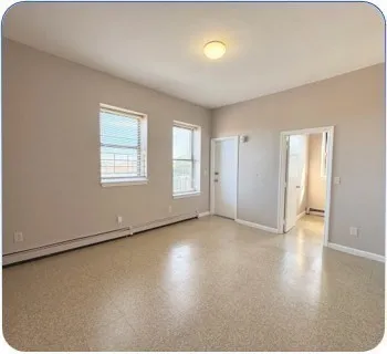 a view of a bathroom with toilet a sink and a vanity