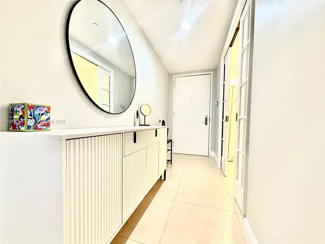 a bedroom with a bed and a cabinets