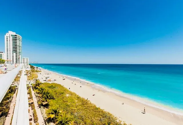 a view of city with ocean
