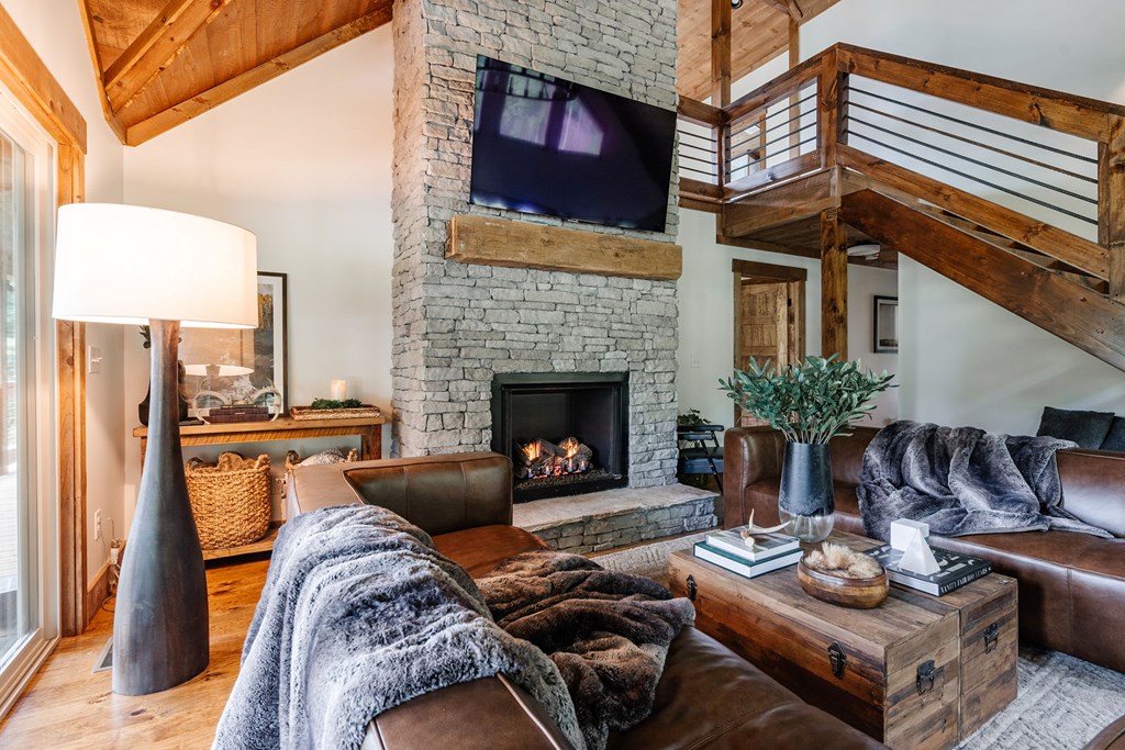 89 High Mdws Drive Morganton, GA 30560 - Photo 15 of 63 a living room with furniture and a fireplace