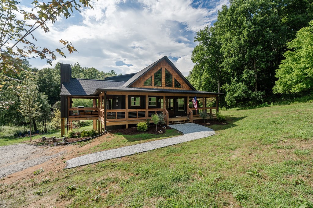 89 High Mdws Drive Morganton, GA 30560 - Photo 2 of 63 a view of house with yard and sitting area