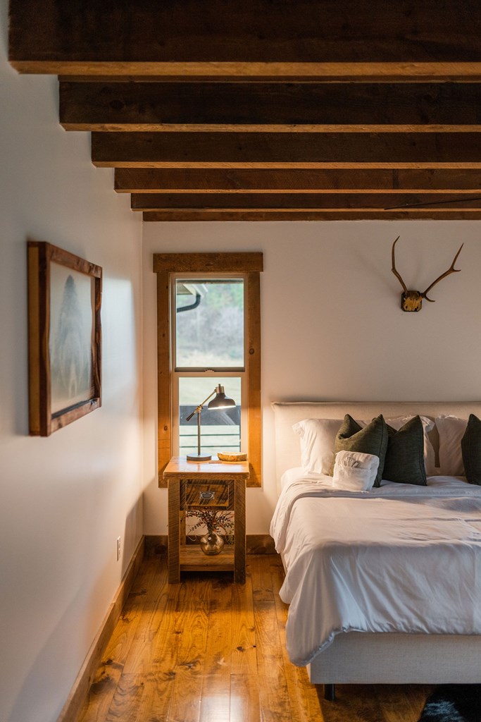 89 High Mdws Drive Morganton, GA 30560 - Photo 46 of 63 a bedroom with a bed and window