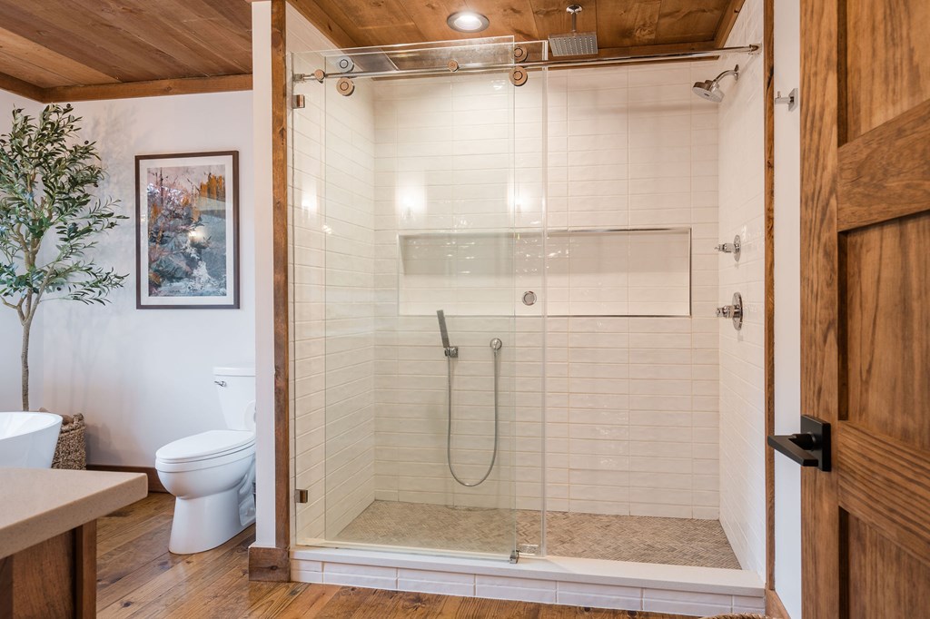 89 High Mdws Drive Morganton, GA 30560 - Photo 49 of 63 a bathroom with a glass shower door