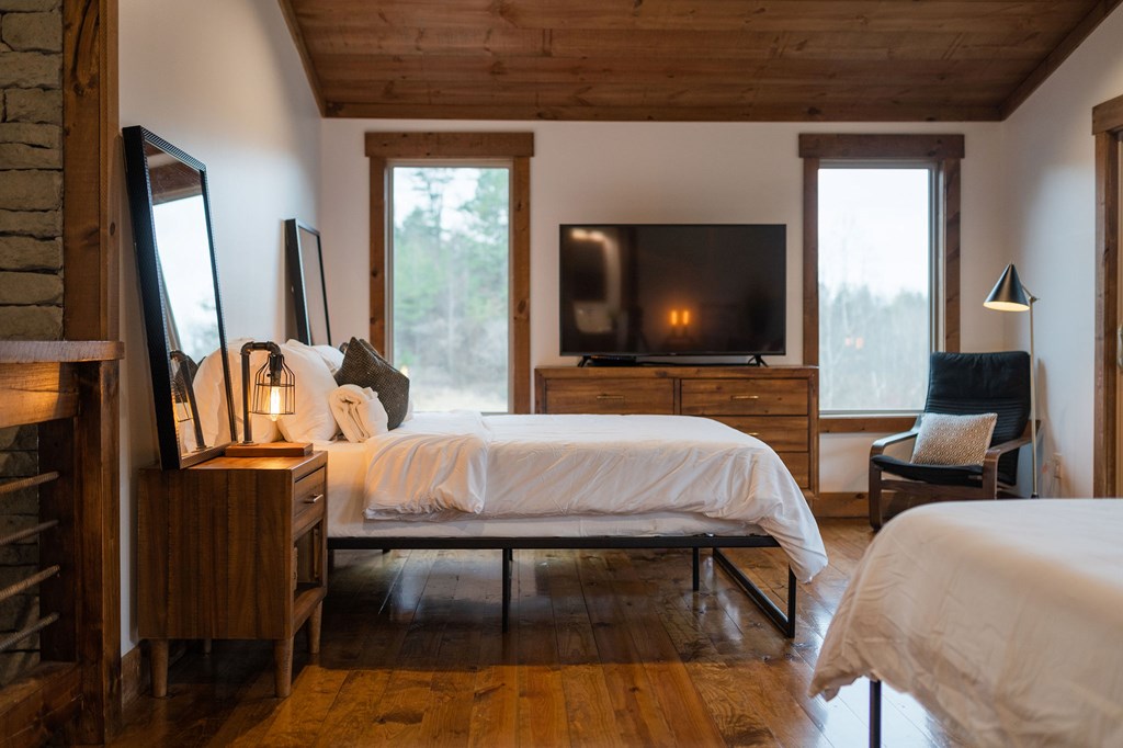 89 High Mdws Drive Morganton, GA 30560 - Photo 53 of 63 a bedroom with furniture and a flat screen tv