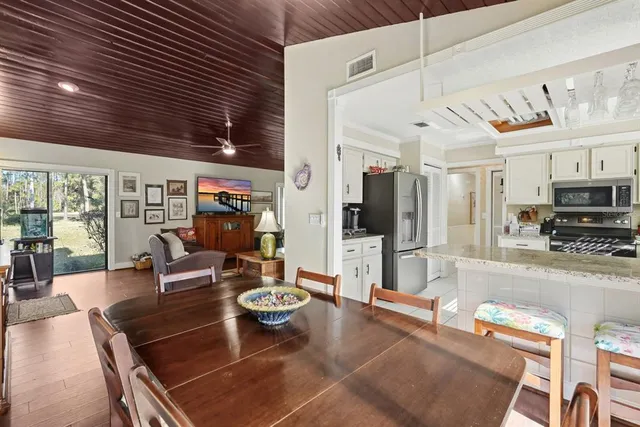 a dining room with furniture