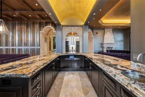 a kitchen with granite countertop lots of counter top space