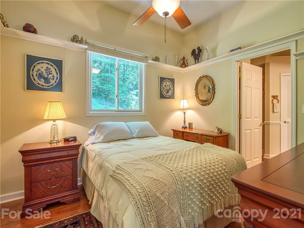 21 Rules Run Road Clyde, NC 28721 - Photo 20 of 32 a bedroom with a bed and a window