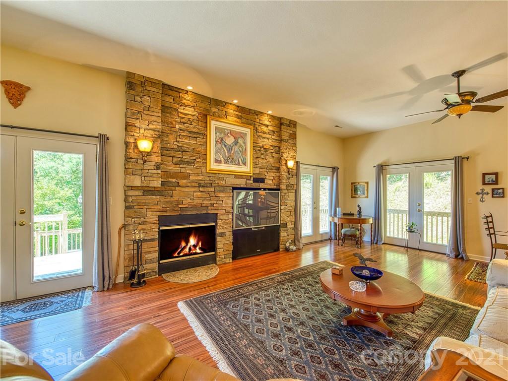 21 Rules Run Road Clyde, NC 28721 - Photo 4 of 32 a living room with furniture and a fireplace