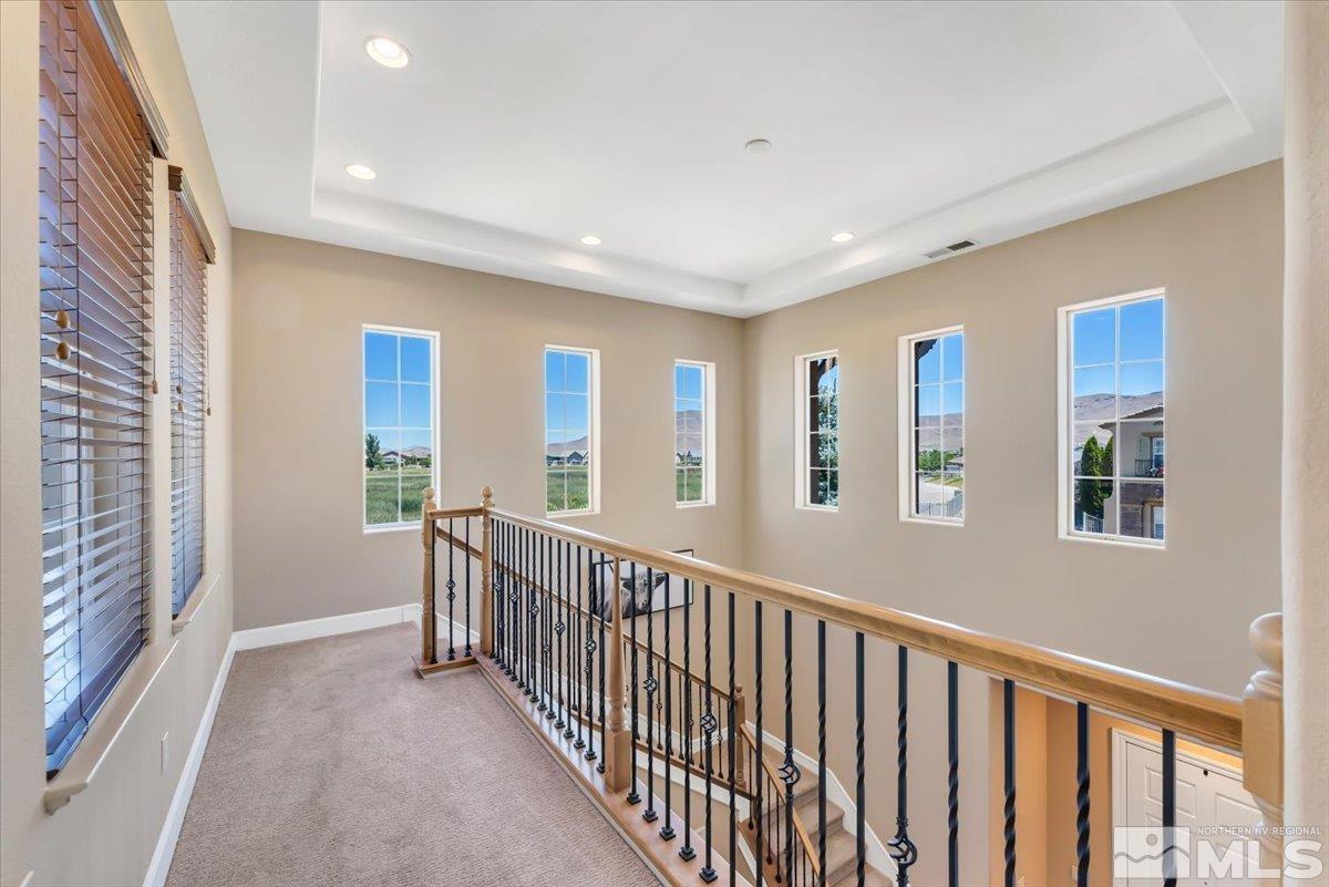 10675 Solano Court Reno, NV 89521 - Photo 18 of 39 a view of hallway with windows