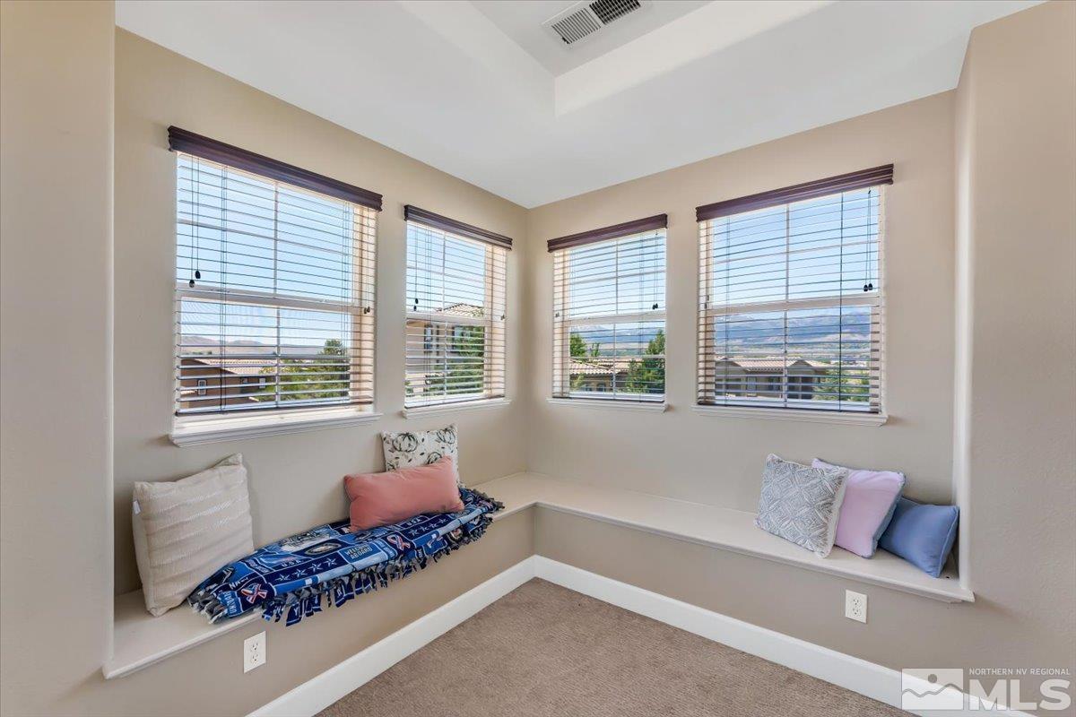 10675 Solano Court Reno, NV 89521 - Photo 25 of 39 a room with furniture and window