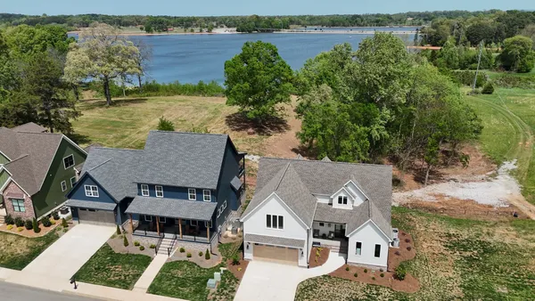 an aerial view of a house with a garden