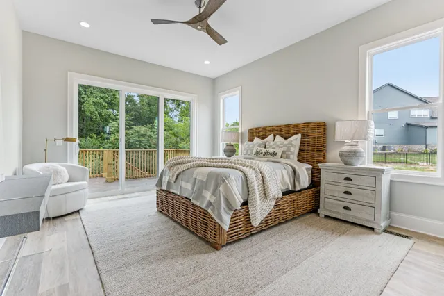 a bathroom with a sink toilet a bathtub and vanity