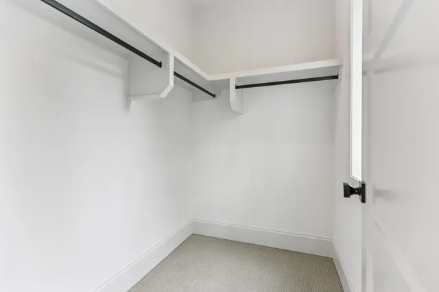 a view of a lake with a house in the background