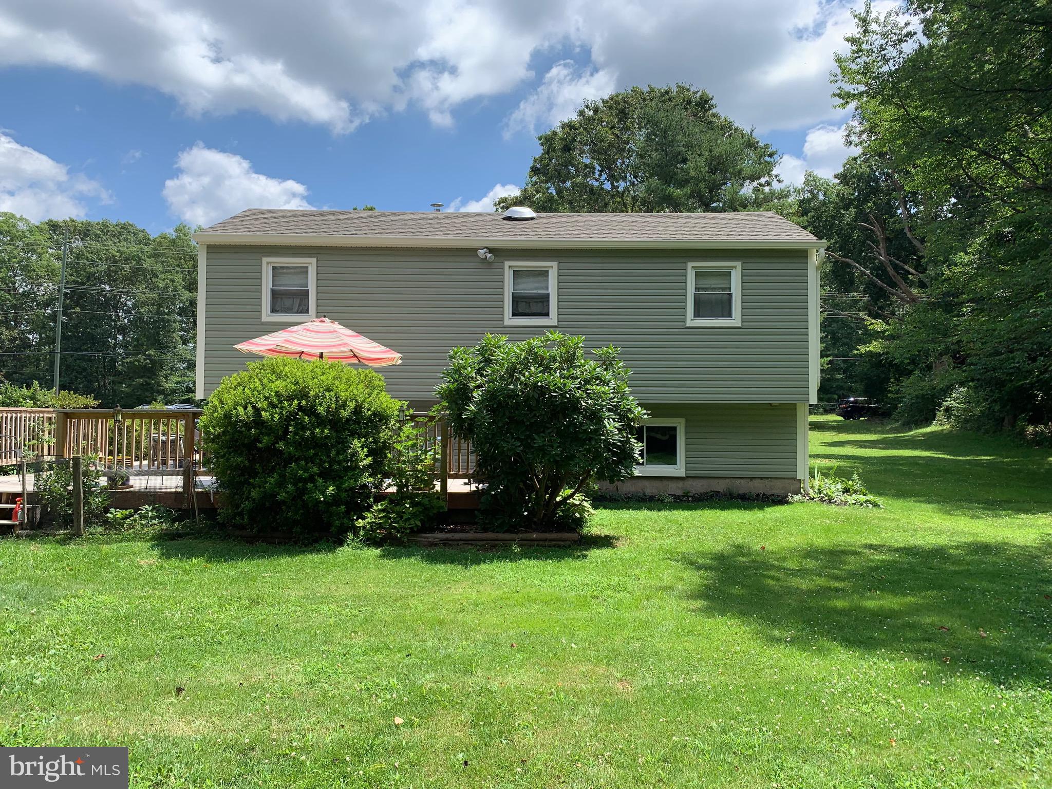 2409 Fries Mill Road Williamstown, NJ 08094 - Photo 30 of 30 a front view of a house with garden