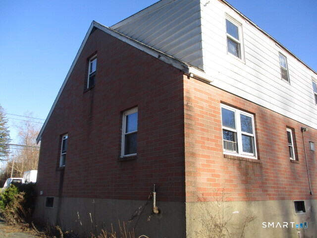 71 Broad Street Meriden, CT 06450 - Photo 2 of 21 a view of a house