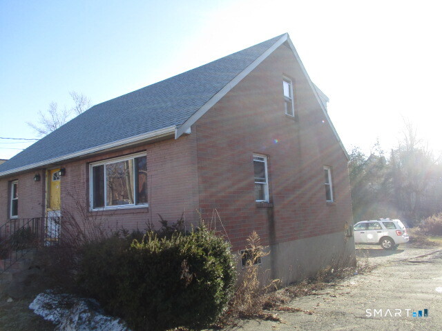 71 Broad Street Meriden, CT 06450 - Photo 4 of 21 a front view of a house