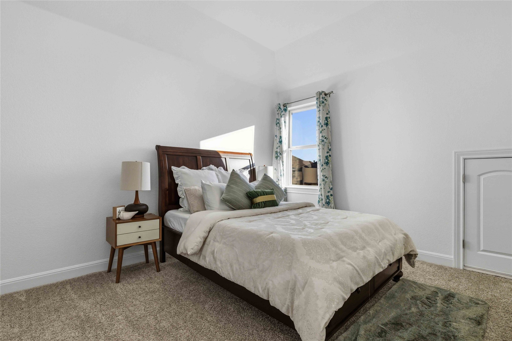 1517 Bardella Drive Leander, TX 78641 - Photo 21 of 40 Bedroom featuring baseboards and light carpet