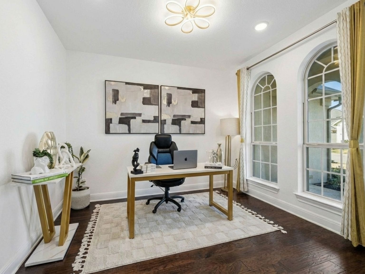 1517 Bardella Drive Leander, TX 78641 - Photo 4 of 40 Home office featuring baseboards, dark wood-type flooring and designer chandelier