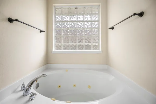 a view of a bathtub in a bathroom