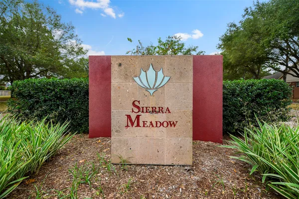 a sign on the side of the road