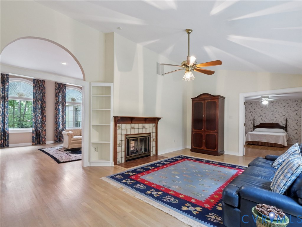 9010 Kings Crown Road North Chesterfield, VA 23236 - Photo 12 of 36 a living room with furniture and a fireplace