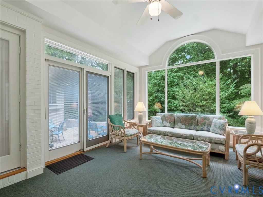 9010 Kings Crown Road North Chesterfield, VA 23236 - Photo 14 of 36 a living room with furniture and a large window