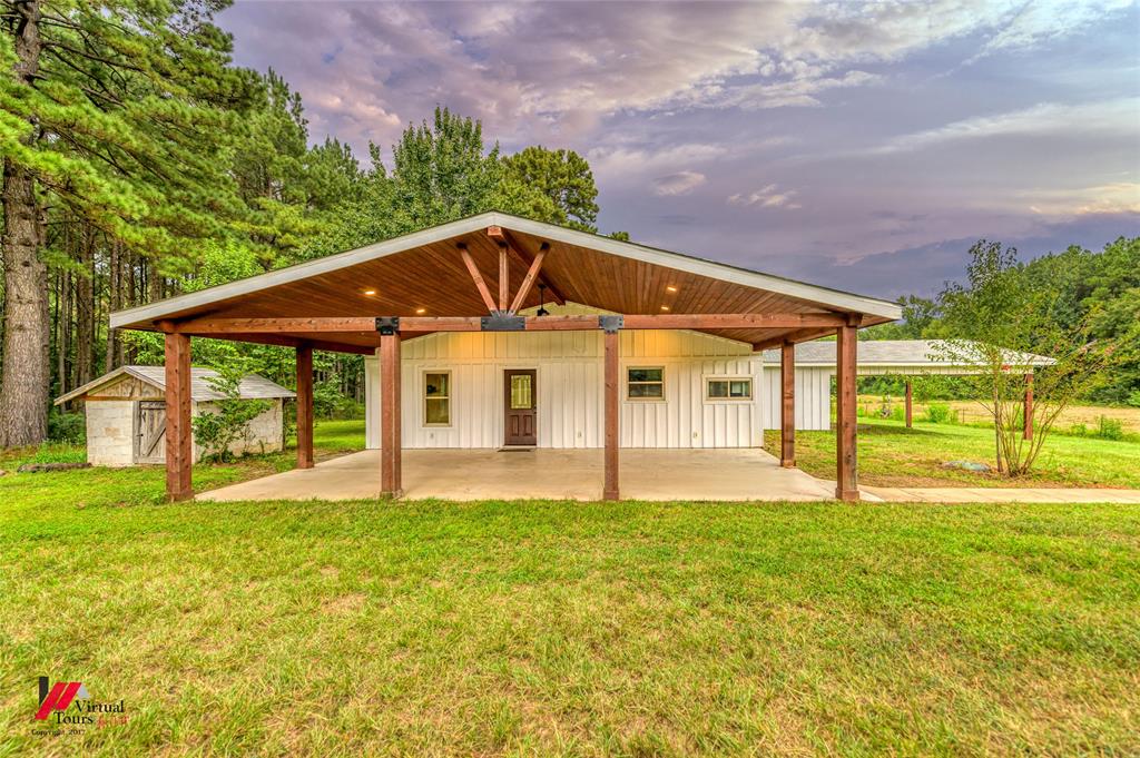 1177 Princeton Road Princeton, LA 71067 - Photo 2 of 34 a front view of a house with a yard
