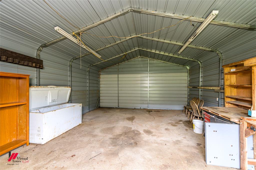 1177 Princeton Road Princeton, LA 71067 - Photo 26 of 34 a view of a garage of the house