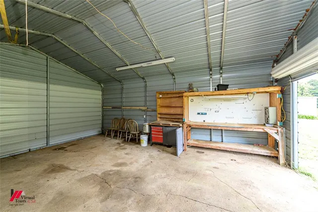 a view of a garden with a building in the background