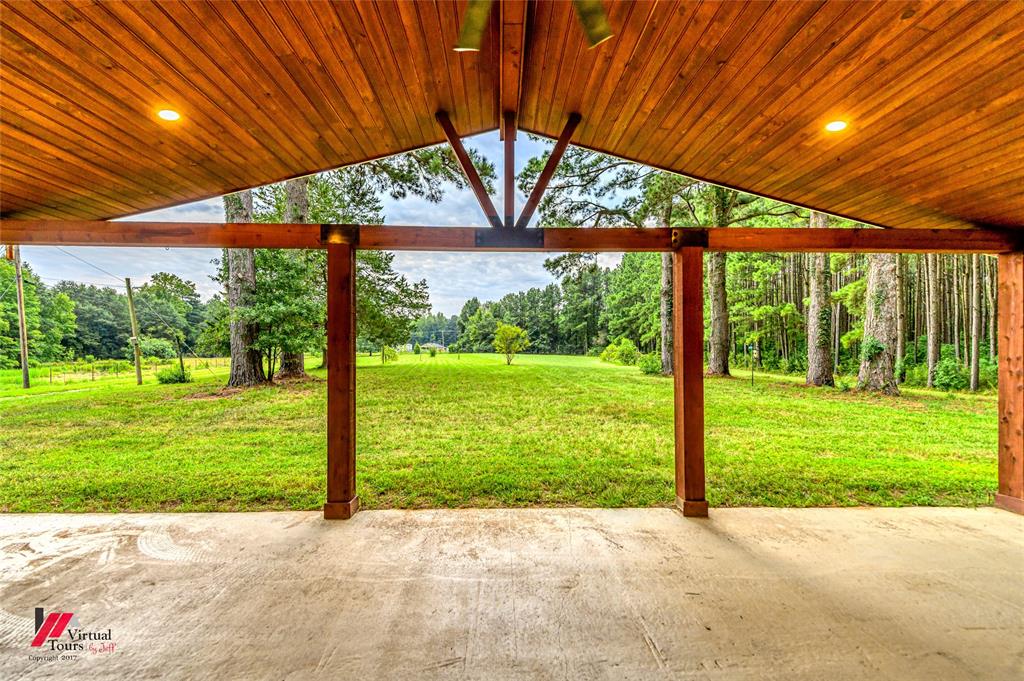 1177 Princeton Road Princeton, LA 71067 - Photo 5 of 34 a view of a patio with a backyard