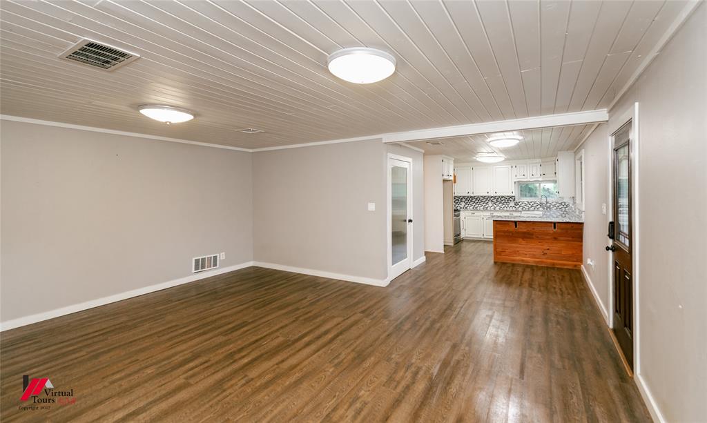 1177 Princeton Road Princeton, LA 71067 - Photo 7 of 34 a view of a hallway with wooden floor