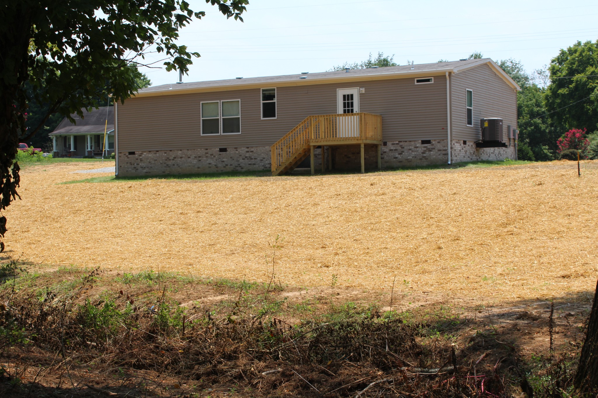 599 Days Road Lafayette, TN 37083 - Photo 2 of 16 a house view with a outdoor space