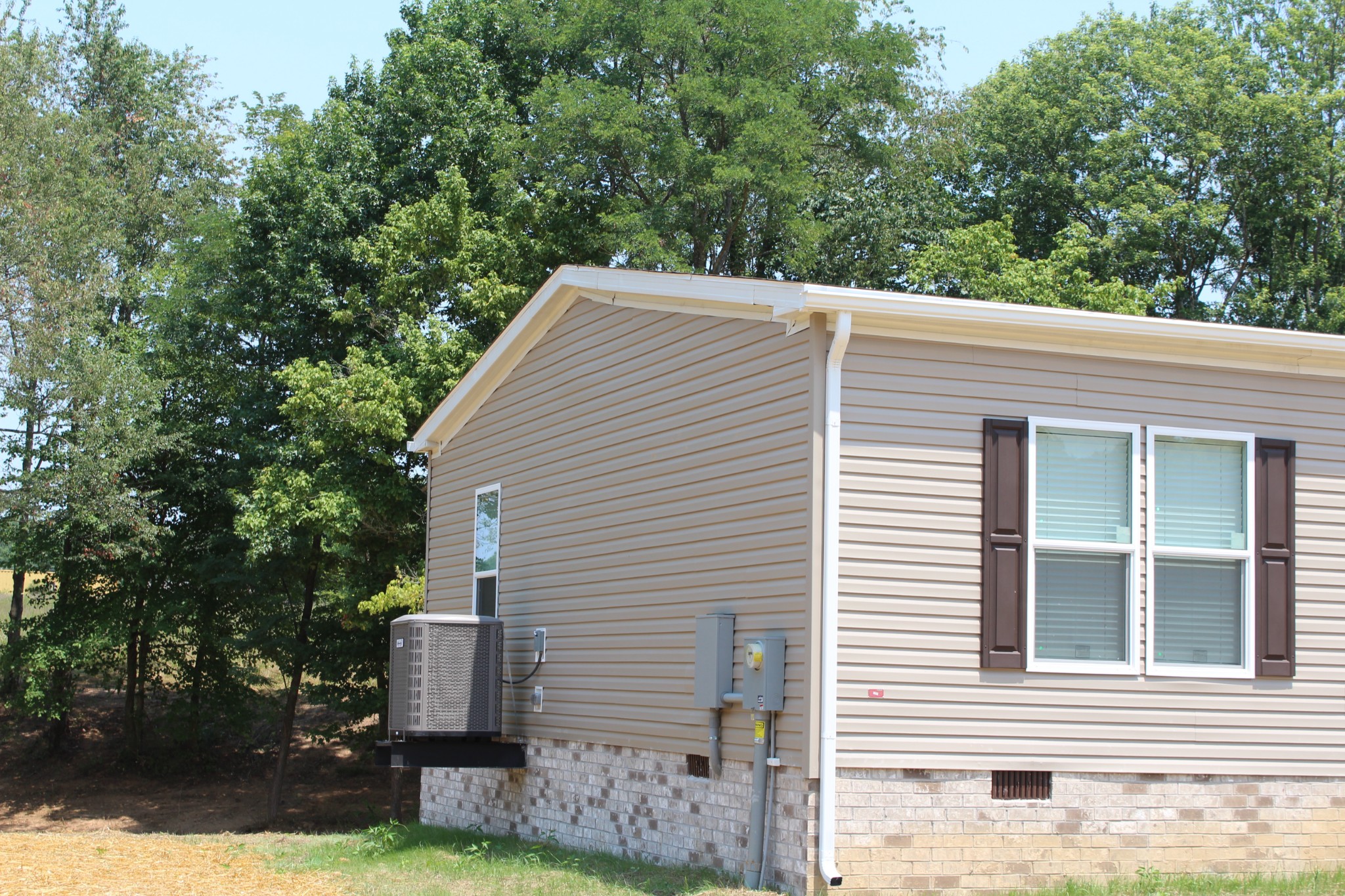 599 Days Road Lafayette, TN 37083 - Photo 4 of 16 a view of a house with a yard