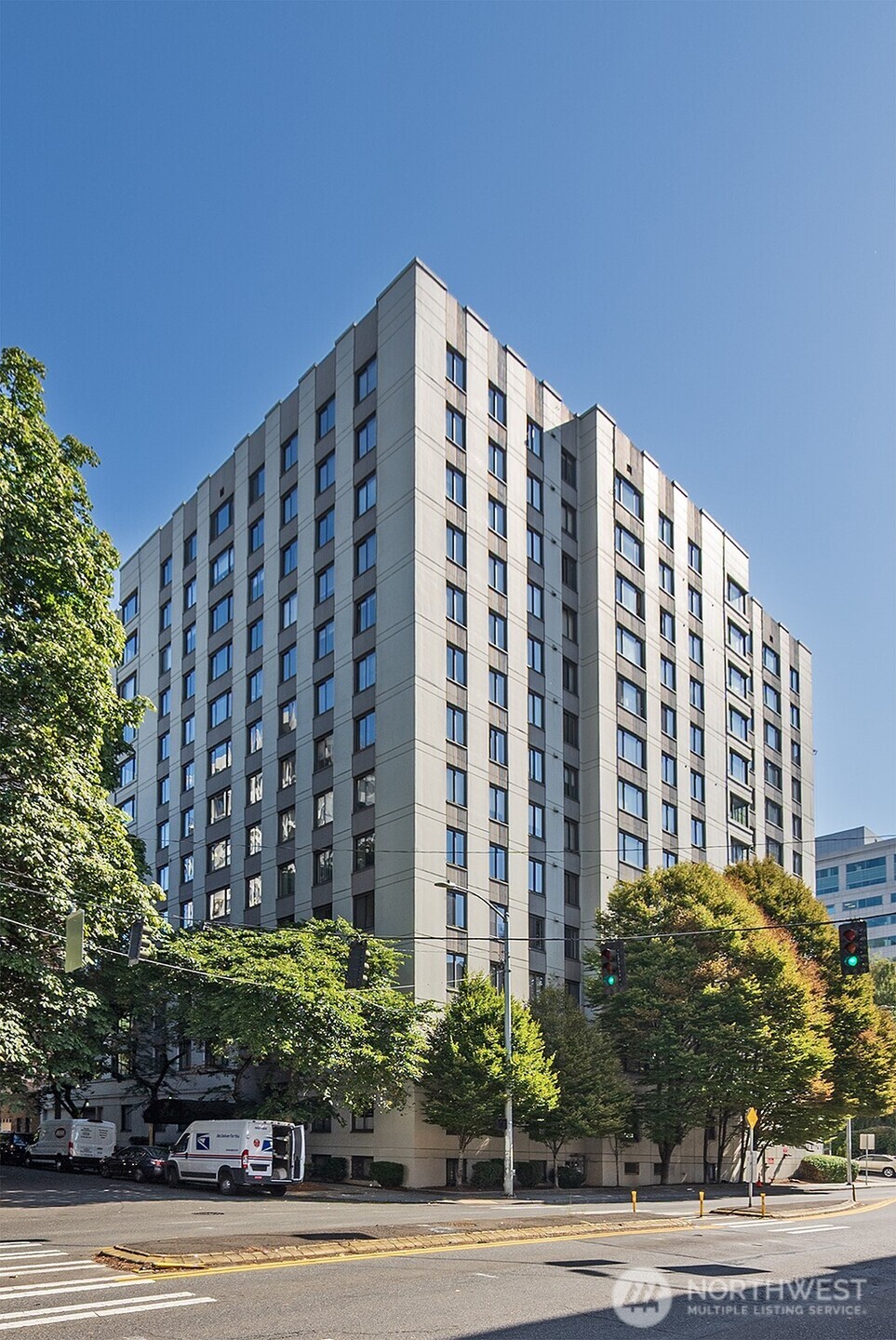 1105 Spring Street, Unit 709 Seattle, WA 98104 - Photo 1 of 30 a front view of a building