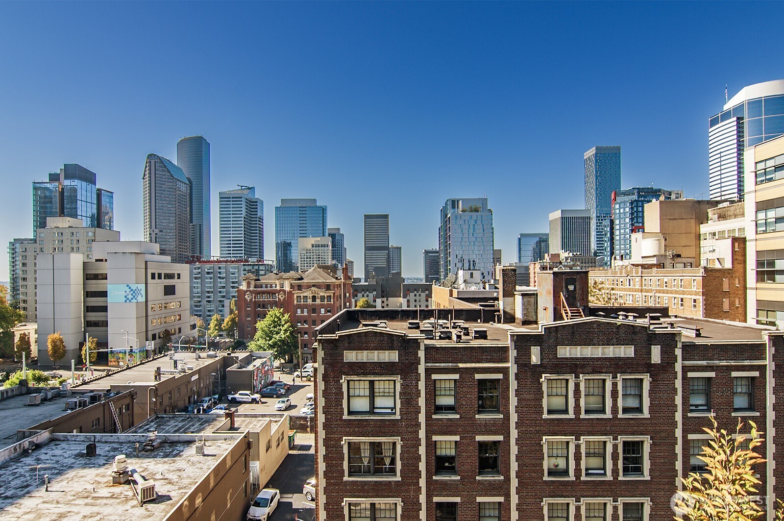 1105 Spring Street, Unit 709 Seattle, WA 98104 - Photo 13 of 30 a view of a city with tall buildings
